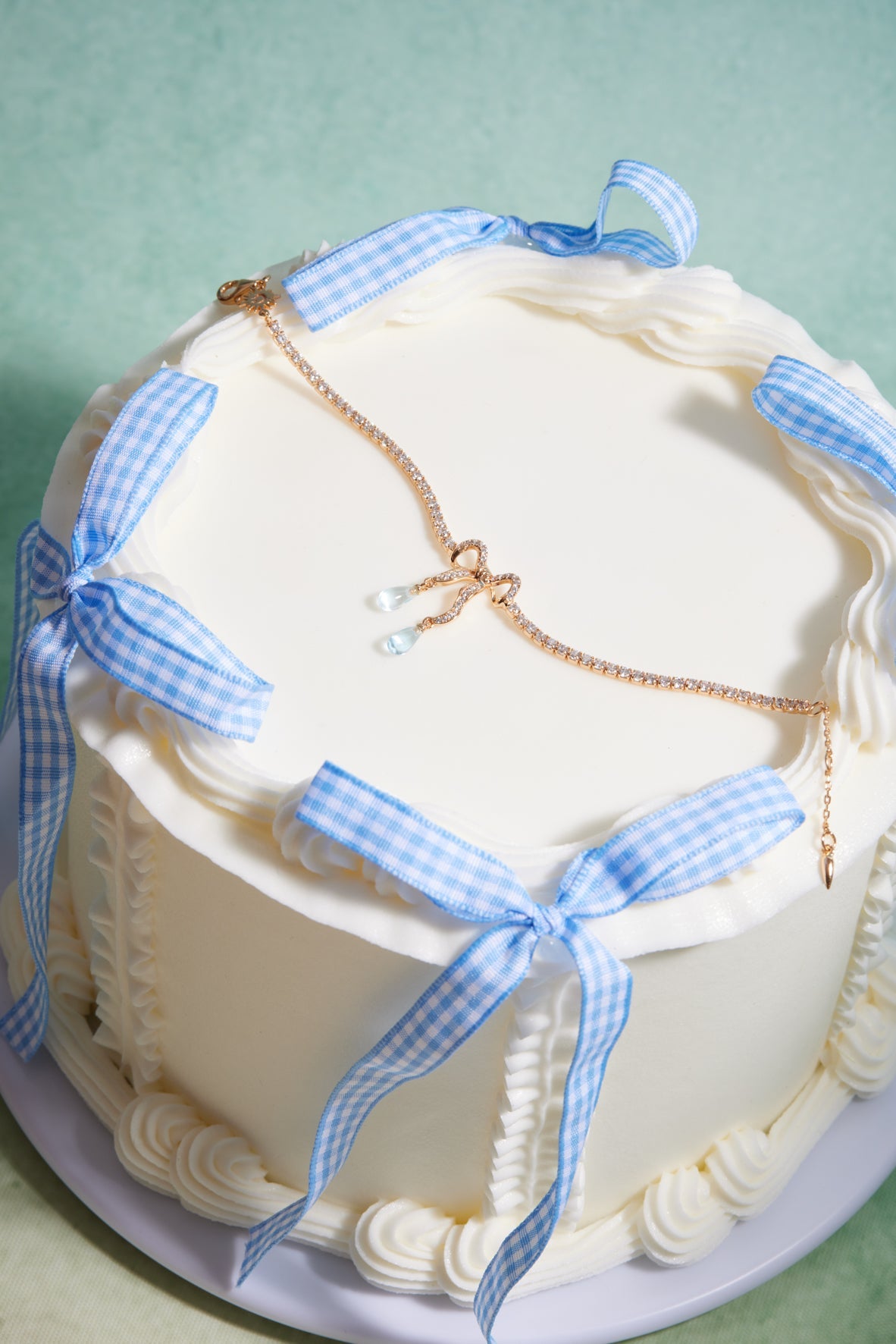 Blue Topaz Gold Bow Tennis Bracelet - Alice