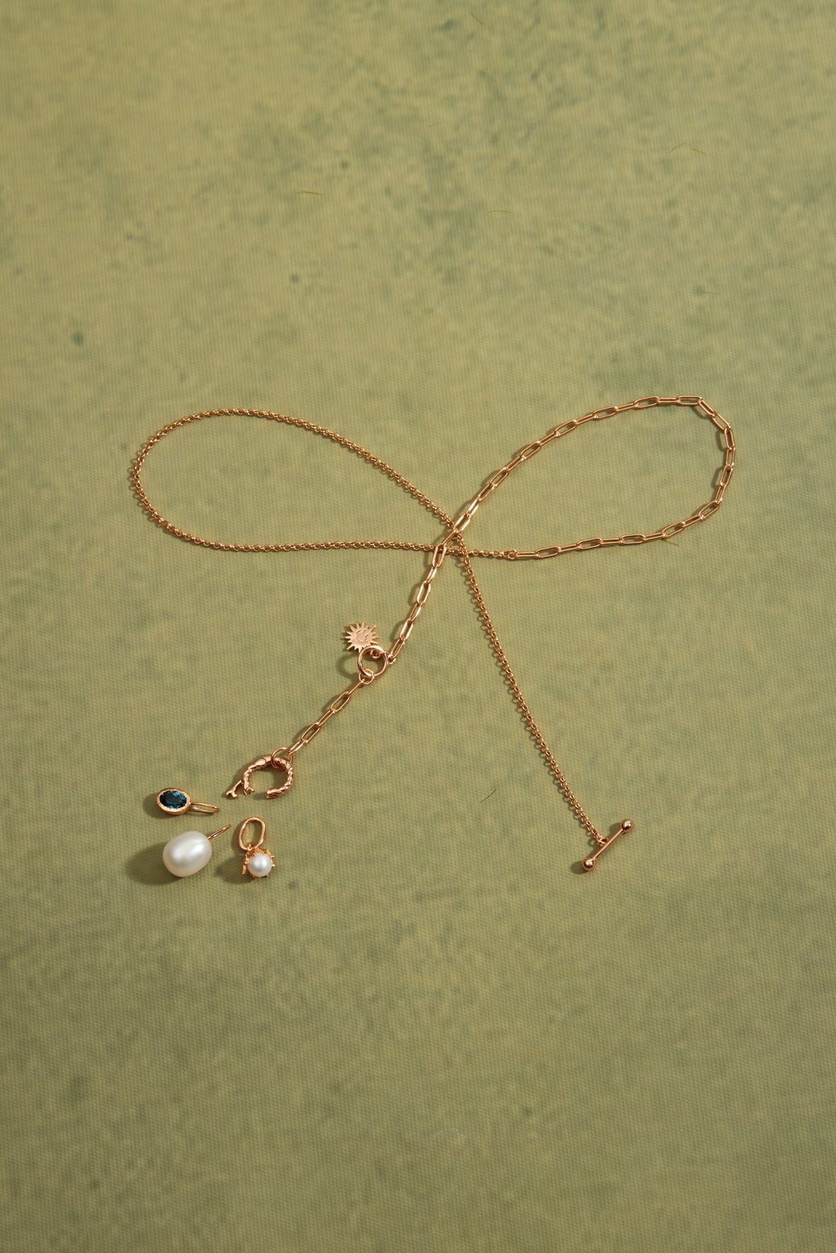 Oval Blue Topaz Gold Pendant